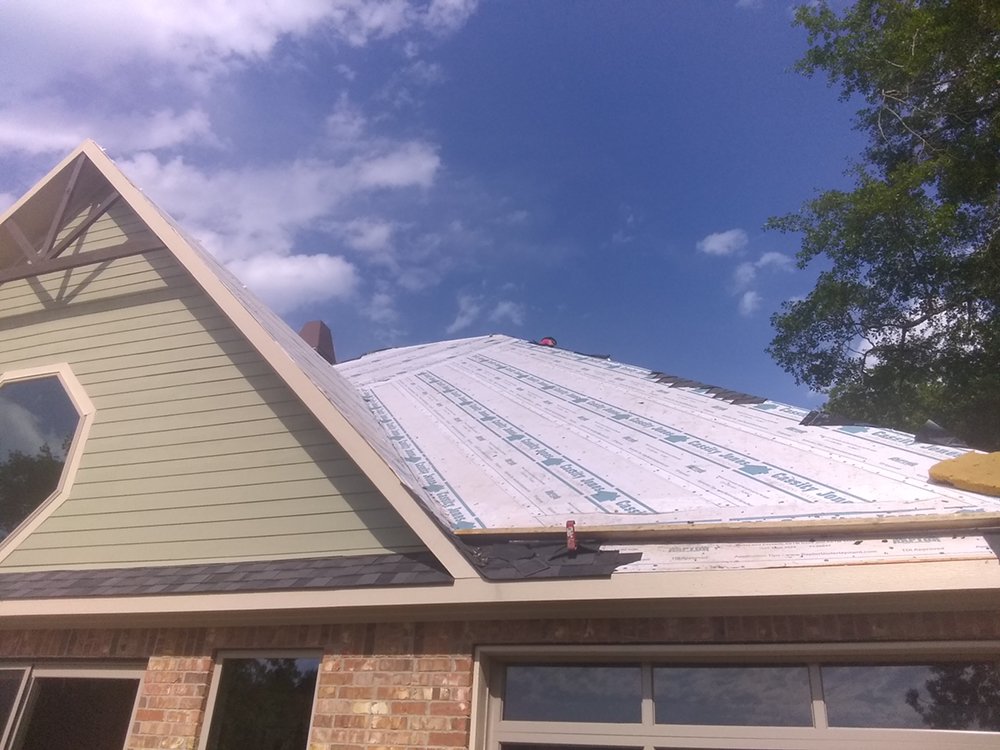 Slide of El Sol Roofing