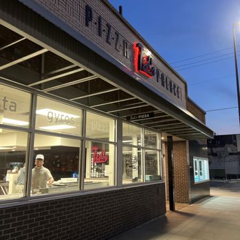 Ted's Pizza Palace - Storefront at night - Pizza Near Me - Menomonie, Wisconsin Ted's Pizza Palace - Storefront at night - Pizza Near Me - Menomonie, Wisconsin