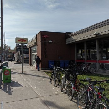 Donlands Subway Station - Station entrance & part of the building from the sidewalk of Donlands with Danforth in the distance. October 2019 - Public Transportation Near Me - Toronto, Ontario Donlands Subway Station - Station entrance & part of the building from the sidewalk of Donlands with Danforth in the distance. October 2019 - Public Transportation Near Me - Toronto, Ontario