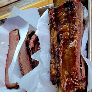 Black's Barbecue Austin - Beef Rib on the right and lean brisket on the left - Barbeque Near Me - Austin, Texas Black's Barbecue Austin - Beef Rib on the right and lean brisket on the left - Barbeque Near Me - Austin, Texas