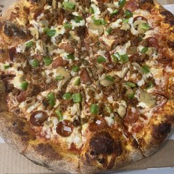 The Pizza Company - Supreme pizza 
Pepperoni, mushroom, green pepper onions and sausage