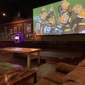 Fast Eddie's Billiards Austin-Northfork - Comfy seating in front of ginormous big screen - Pool Halls Near Me - Austin, Texas