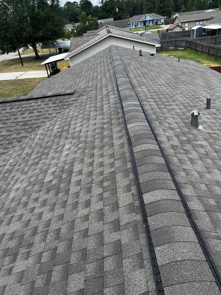 Slide of VG Roofing Service