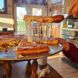 Perillo's Pizzeria - Cheese pull is what it is all about with these pies. This thing was HOT and it stayed hot, just like it should have.