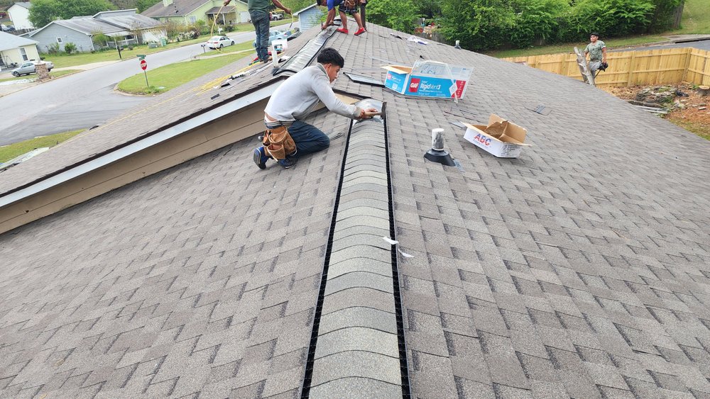 Slide of JS Roofing Group