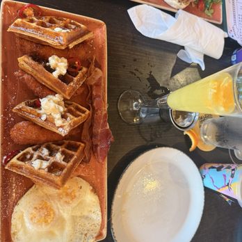 Hard Rock Cafe - Chicken, waffles, bacon and eggs with hot honey and syrup. - Burgers Near Me - Honolulu, Hawaii Hard Rock Cafe - Chicken, waffles, bacon and eggs with hot honey and syrup. - Burgers Near Me - Honolulu, Hawaii