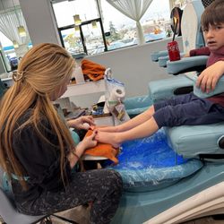 Luxury Nails Spa - This is my grandson, getting his monthly cleanup with the technician one