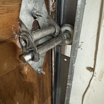 Palms Garage Doors - The new roller he replaced and put back in the tracking - Garage Door Services Near Me - San Jose, California Palms Garage Doors - The new roller he replaced and put back in the tracking - Garage Door Services Near Me - San Jose, California