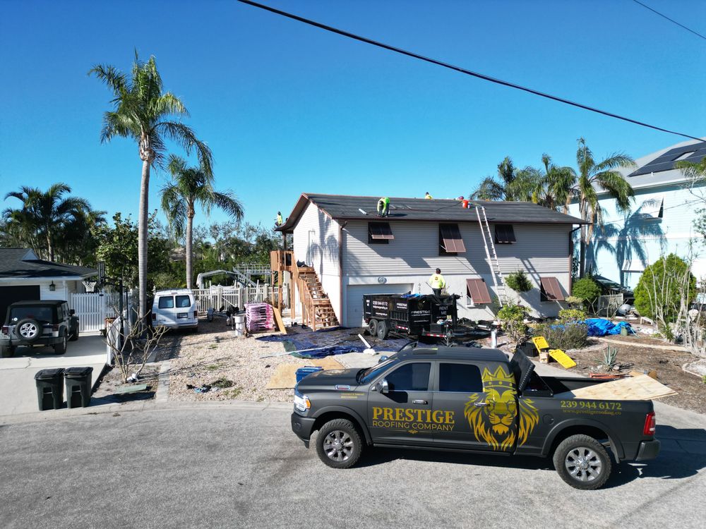 Slide of Prestige Roofing Company