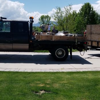 Yard Care Services - a black truck with a flat bed - Irrigation Near Me - Logan, Utah