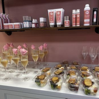 Rella Aesthetics - The products are up above and champagne and snack boxes on table below. - Medical Spas Near Me - Vacaville, California Rella Aesthetics - The products are up above and champagne and snack boxes on table below. - Medical Spas Near Me - Vacaville, California