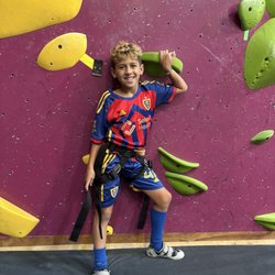 Crux Climbing Center - Cruz posing with his gear