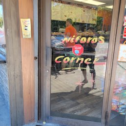the reflection of a man in the window