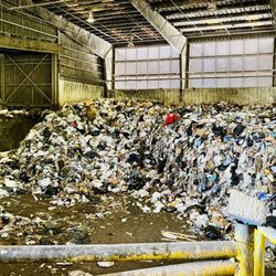 Keehi Transfer Station - Back your car up to the metal fence to toss your items over into the 'pit'!