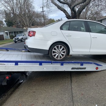 Advanced Towing - Car being towed from drive way - Towing Near Me - Fremont, California Advanced Towing - Car being towed from drive way - Towing Near Me - Fremont, California