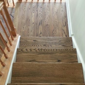 Burdick Hardwood Flooring - a close up of a staircase - Flooring Near Me - Bartlett, Illinois Burdick Hardwood Flooring - a close up of a staircase - Flooring Near Me - Bartlett, Illinois
