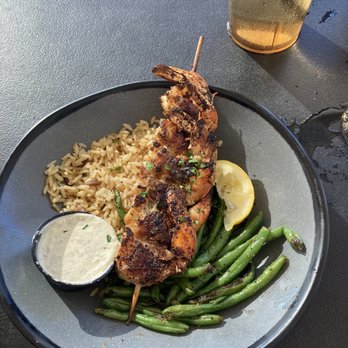 Doc's Seafood & Steaks - Bacon wrapped shrimp with green beans and rice - Seafood Near Me - Corpus Christi, Texas Doc's Seafood & Steaks - Bacon wrapped shrimp with green beans and rice - Seafood Near Me - Corpus Christi, Texas