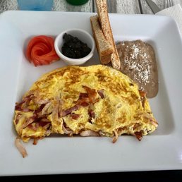 Protein Omelette with Turkey, and Turkey bacon, beans, and toast.