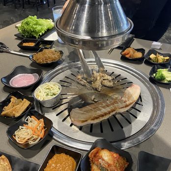 Ember Korean BBQ - small intestines and pork belly along with the side dishes they give. ssamjang sauce is a must try - Korean Near Me - Elk Grove, California