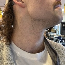 Nini's Barber Shop - This was the guy in the middles idea of a "finished job", didn't really seem too enthusiastic to get my hair or my face done properly.