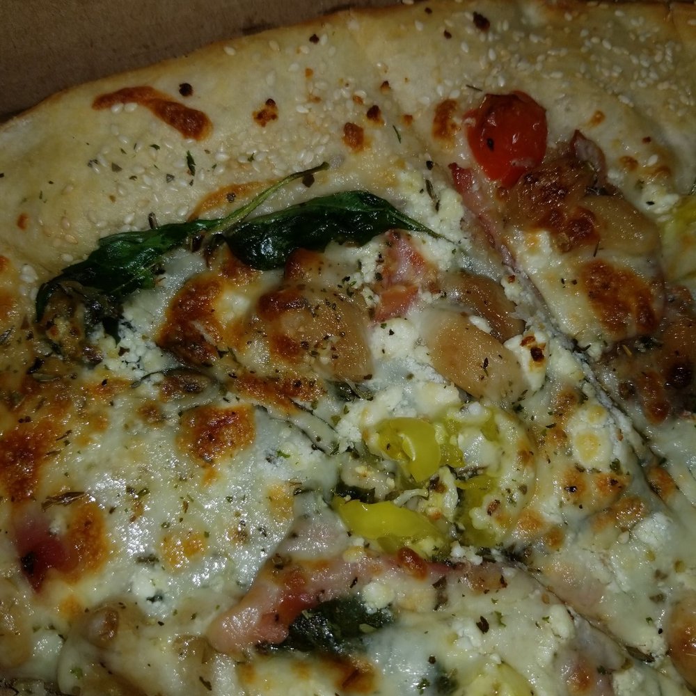 Ramundo's Pizzeria - There are 3 pieces of spinach on this XL pizza - Pizza Near Me - Cincinnati, Ohio Ramundo's Pizzeria - There are 3 pieces of spinach on this XL pizza - Pizza Near Me - Cincinnati, Ohio