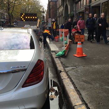 Beneath the Streets - Combo of asphalt sinking in over time and with weight of traffic makes the curb way higher than the street. - Historical Tours Near Me - Seattle, Washington