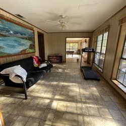 hawthorne fish & Fun - From doorway that leads to Little House, sunroom with futon and exercise equipment and game room with pool table
