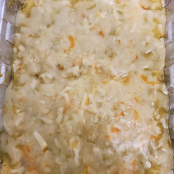 Tita's Mexican Kitchen - a casserole dish with cheese and onions - Mexican Near Me - Big Spring, Texas Tita's Mexican Kitchen - a casserole dish with cheese and onions - Mexican Near Me - Big Spring, Texas