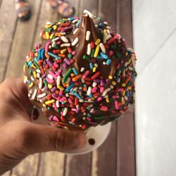 Corner Cone - Medium Ice cream cone dipped in chocolate and sprinkled.