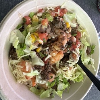 Hot Peppers - Steak and Shrimp with regular queso, pico, corn, lettuce and cheese - Mexican Near Me - New York, New York Hot Peppers - Steak and Shrimp with regular queso, pico, corn, lettuce and cheese - Mexican Near Me - New York, New York