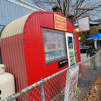 World's Smallest Diner - a small red food truck parked in front of a building - Hot Dogs Near Me - Watkins Glen, New York World's Smallest Diner - a small red food truck parked in front of a building - Hot Dogs Near Me - Watkins Glen, New York