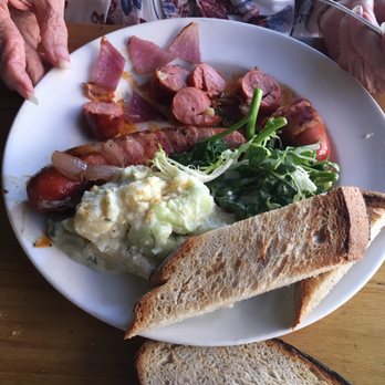 Cafe Katja - Yummy! Sausage wrapped in bacon!!! - German Near Me - New York, New York