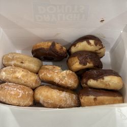 Daylight Donut - Donuts just thrown in the box seemed old and stale.