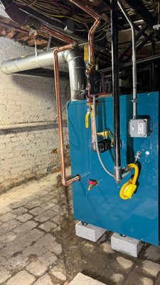 R. Spagnuolo Plumbing & Heating Logo