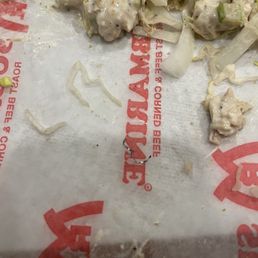 Tuna sandwich with a piece of wire or plastic Tuna sandwich with a piece of wire or plastic
