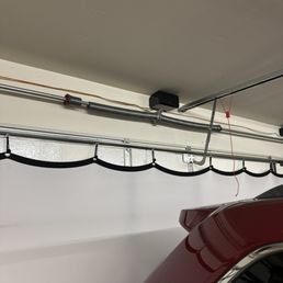 original broken garage door spring (left Side) original broken garage door spring (left Side)