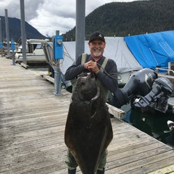 Jensens Boat Rentals - My buddy Ed with 80 lb halibut caught with help of Jensen's Boats!