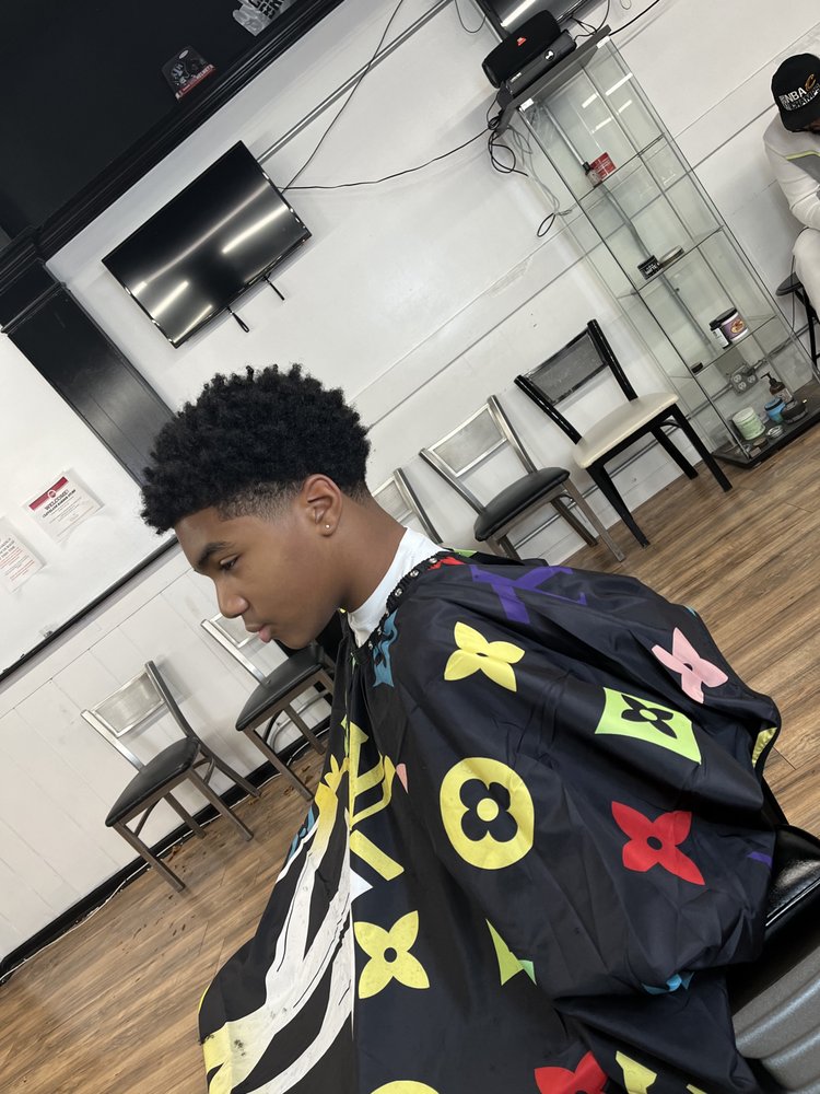 Lex Wavy Cuts Logo