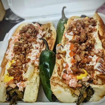Dogos Obson - two hot dogs in a styrofoam container - Food Trucks Near Me - Astoria, Oregon Dogos Obson - two hot dogs in a styrofoam container - Food Trucks Near Me - Astoria, Oregon