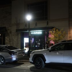 MAC Cosmetics - An evening storefront view.