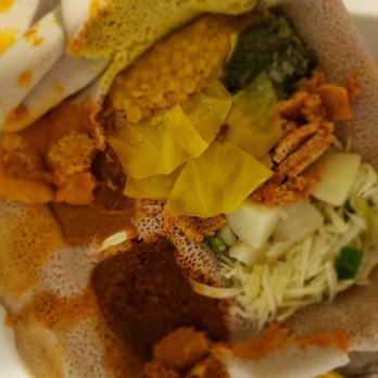 Meaza Restaurant - Vegetarian special combo, with spicy lentils, shiro, chickpeas, potatoes, collard greens, salad, and cooked cabbage - Ethiopian Near Me - Falls Church, Virginia