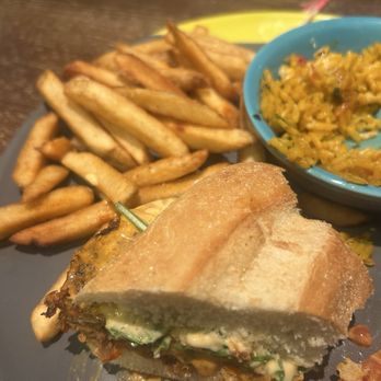 Nando's Peri-Peri - Fries with Veggie Burger and portugese rice - Chicken Shop Near Me - Alexandria, Virginia Nando's Peri-Peri - Fries with Veggie Burger and portugese rice - Chicken Shop Near Me - Alexandria, Virginia