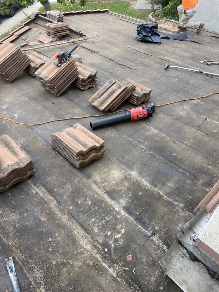 Slide of Mencho's Roofing & Repairs