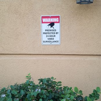La Quinta by Wyndham Phoenix I-10 West - The sign stating that their premises are under video surveillance. - Hotels Near Me - Phoenix, Arizona La Quinta by Wyndham Phoenix I-10 West - The sign stating that their premises are under video surveillance. - Hotels Near Me - Phoenix, Arizona