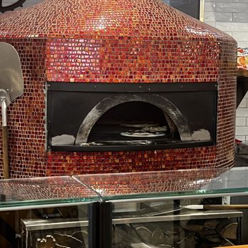 Woodgrain Pizzeria - a pizza oven in a restaurant - Pizza Near Me - Chicago, Illinois