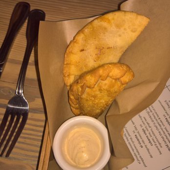Lechon - 1 each of the fried piquillo pepper & fried pork empanadas. Amazing!!! - Tapas Bars Near Me - Portland, Oregon