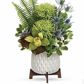 William Paul Design - No stand/vase. Paid Xtra $10 for higher end flowers - none. Blue flowers have no centers. Run! - Florists Near Me - Austin, Texas William Paul Design - No stand/vase. Paid Xtra $10 for higher end flowers - none. Blue flowers have no centers. Run! - Florists Near Me - Austin, Texas