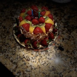a cake with strawberries and kiwis a cake with strawberries and kiwis