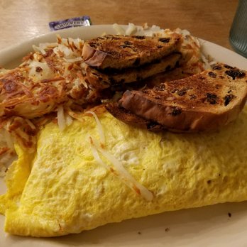Flynnie's Diner - 3 egg bacon cheeseburger omelette with hasbrowns and raisin toast. - American Near Me - Dixon, Illinois Flynnie's Diner - 3 egg bacon cheeseburger omelette with hasbrowns and raisin toast. - American Near Me - Dixon, Illinois