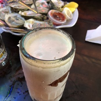 Lazy Flamingo - Frosty mug and bakers dozen raw Ice Cold Oysters On The Half Shell - Seafood Near Me - Bokeelia, Florida Lazy Flamingo - Frosty mug and bakers dozen raw Ice Cold Oysters On The Half Shell - Seafood Near Me - Bokeelia, Florida
